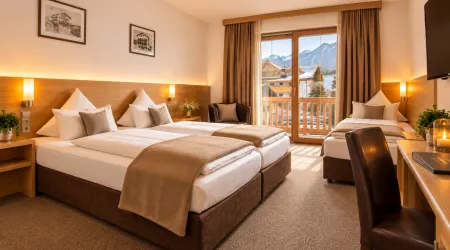 Geräumiges Zimmer mit zwei Betten und Bergblick
